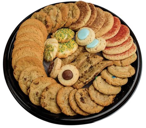 Cookie tray cookies - Cookie Jar Holiday Tray: Decorated Cutout Cookie, Sugar Cookie, Red Velvet, Ginger Snap, Snickerdoodle, Double Chocolate Star. Small Tray (18 cookies) $20.00. Medium Tray (3 dozen cookies) $40.00. Large Tray (6 dozen cookies) $72.50. Cutouts By the Dozen $24.00/dz. Our almond flavored cutout cookies in a variety of holiday shapes …
